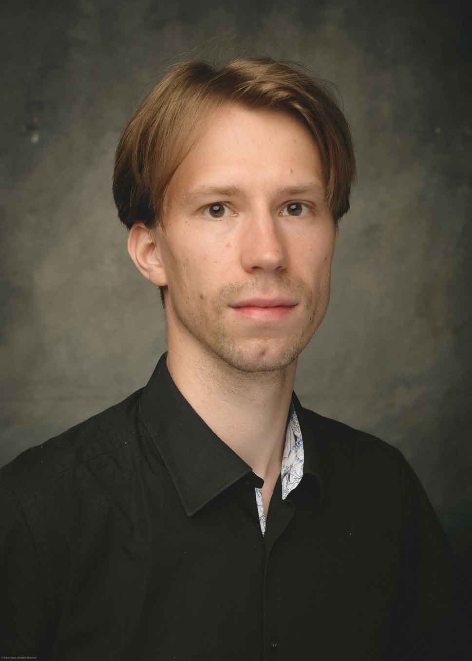 Portraitbild von Georg Demel, Posaunist des Ensemble Ambidexter